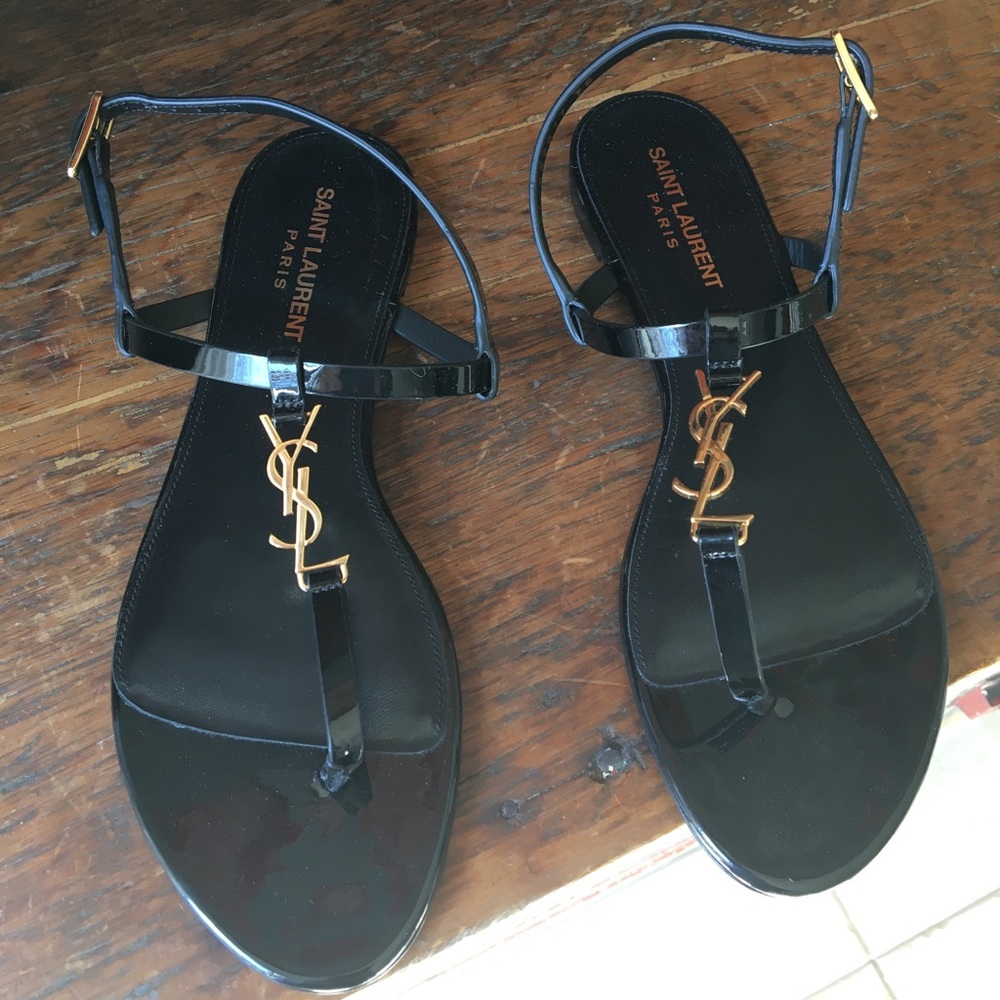 YSL Cassandra flat sandals